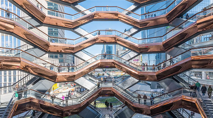 A panoramic view of the New York City skyline featuring the atrium, showcasing modern architecture and vibrant city life